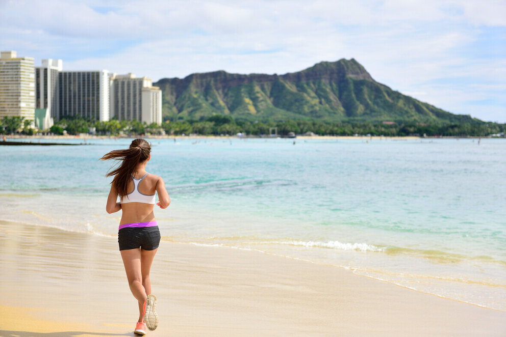 Woman running on beach
