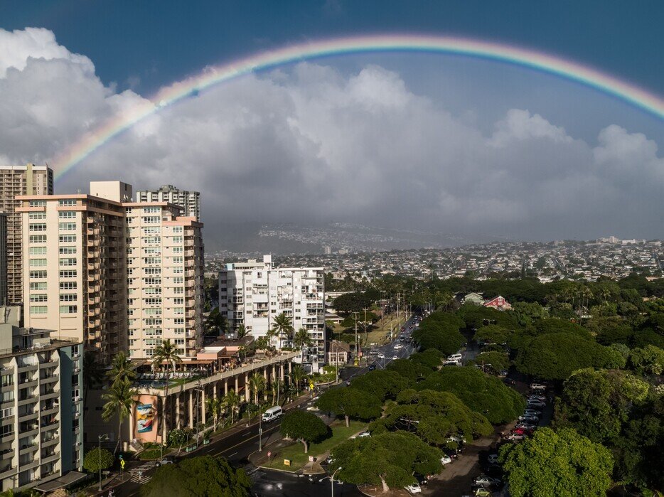 Rainbow over city