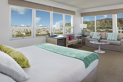 View from bed in hotel room of living room